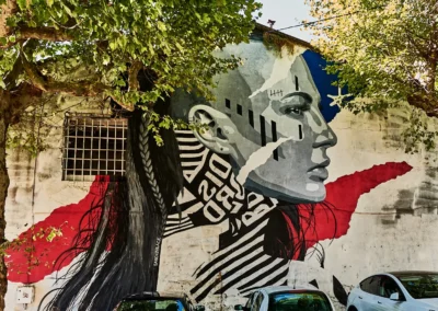 Peinture Urbaine : Une Marianne Moderne, Place de la Mairie à Bessèges, artiste : Sancko Black